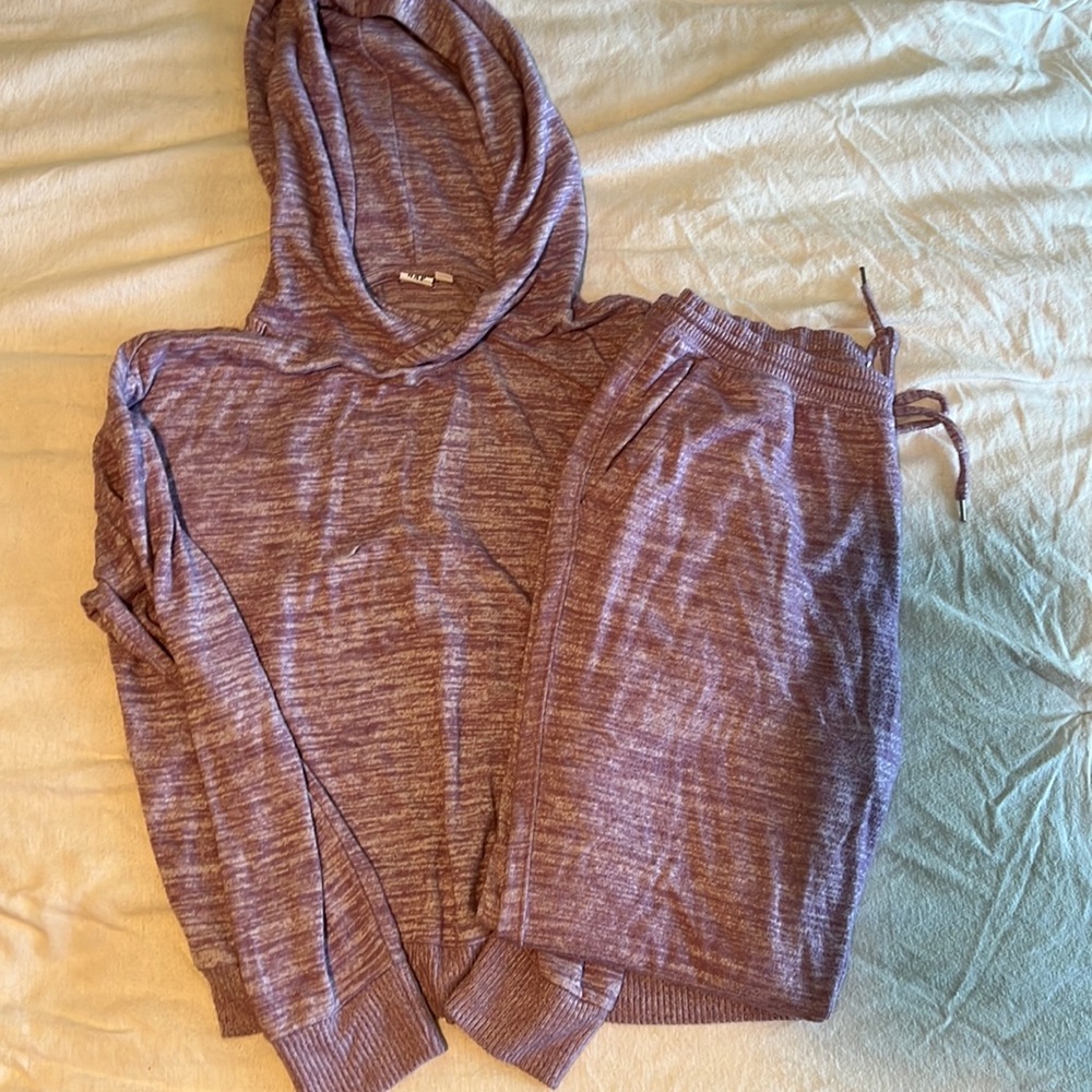 Matching hoodie and sweatpants. Never worn